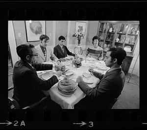 Lensen family eats Hanukkah dinner, Brookline