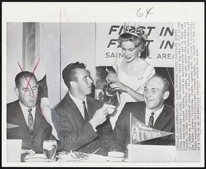 Twins Movie Candidate Greets Local Beauty -- Bob Allison, the Minnesota Twins big bat so far in the young American League season, casts an appreciative eye on Mary Ann Schwab, St. Paul Winter Carnival queen, as she pours him an extra cup of coffee at a breakfast party in St. Paul honoring the homecoming of the Twins. Harmon Killebrew, right, agrees with Allison's appraisal. Twins executive vice president, Joseph Haynes, is caught in the middle of a bite as an unidentified waitress hovers over him.