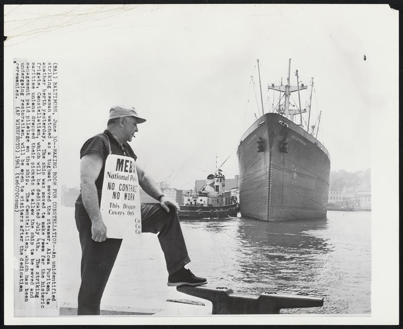 Baltimore -- Making Room For Constellation -- An unidentified striking seaman watched as a tugboat moved the steamer, Alcea Purten, to another berth yesterday. The ship was moved to make room for the historic frigate, Constellation, which will be dedicated July 4th. The striking maritime unions dropped their pickets to allow the ship to be moved and management paid pilotage on the ship. The Constellation, which has been undergoing restoration, will be open to visitors after the dedication ceremonies.