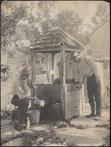 Men using a well
