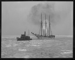 Tug towing schooner through thick ice into Boston Harbor. [Schooner] C. Lockhart. Tug boat [?] Ross.