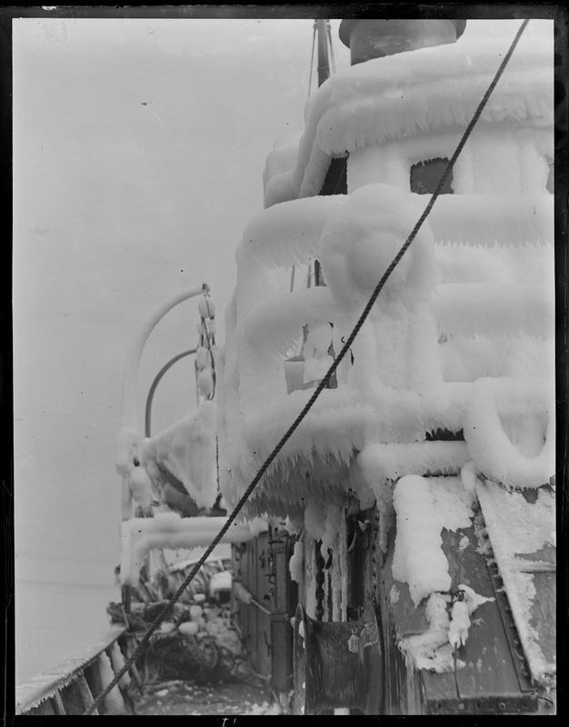 Ice covered fish trawler - fish pier