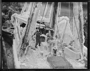 Trawler Mary and Julian covered in ice. By flashbulb.