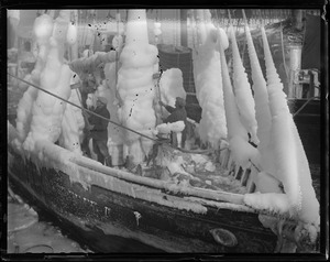 Ice clad boats at fish pier