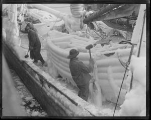 Crew knocking ice off the fishing schooner Killarney