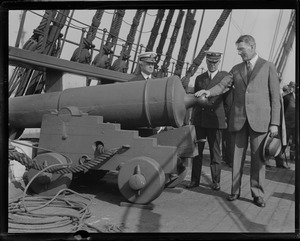 Secretary of Navy Wilbur inspecting guns of USS Constitution