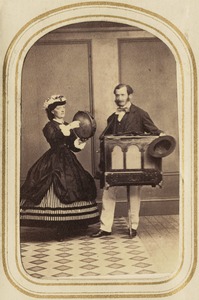Portrait of a woman with a tambourine and a man holding an ornate box [K.J. and E.H.C.?]