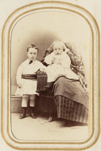Portrait of a child and a baby