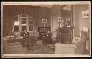 Dormers: man and woman seated in parlor