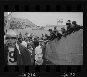 Spectators greeting Boston College players as they pass into stadium during game against Holy Cross football at Schaefer Stadium