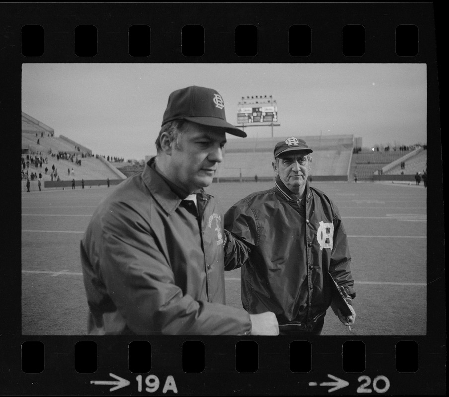 Boston College football coach Joe Yukica shakes hands with Holy Cross football coach Ed Doherty after game at Schaefer Stadium