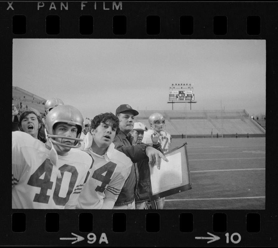 Boston College football coach Joe Yukica (center) and players seen on the sidelines during a game against Holy Cross at Schaefer Stadium