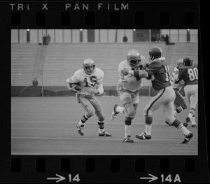 Boston College player Ray Rippman (15) with possession of the ball in a game against Holy Cross at Schaefer Stadium