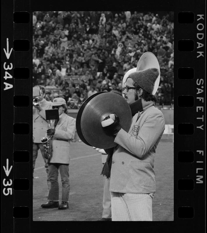 Band member playing cymbals during Boston College vs. Holy Cross football game at Schaefer Stadium