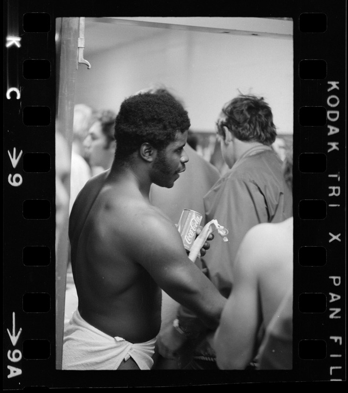 Football player seen in locker room after Boston College vs. Holy Cross game at Schaefer Stadium