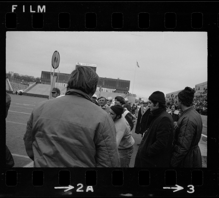 Spectators on sideline of Boston College vs. Holy Cross football game at Schaefer Stadium