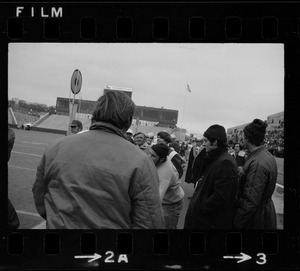 Spectators on sideline of Boston College vs. Holy Cross football game at Schaefer Stadium