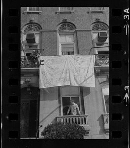 Banner that reads "Cambodia and 4 Murders in Ohio, Let's Stop It Now" hung outside 96 Beacon Street, Boston