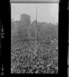Crowd at State House salute flag at half-mast during protest against US march into Cambodia and the killing of four Ohio students at Kent State