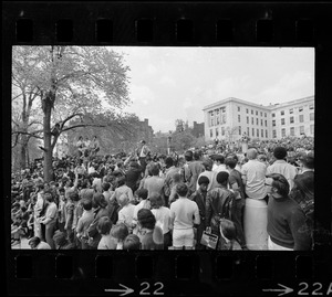 Boston area college students gathered in front of the State House to protest US march into Cambodia and the killing of four Ohio students at Kent State and listening to a man speak