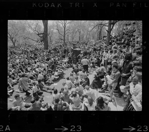 Boston area college students gathered in front of the State House to protest US march into Cambodia and the killing of four Ohio students at Kent State and listening to a man speak