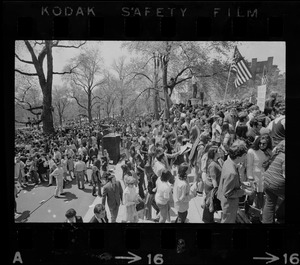 Boston area college students gathered in front of the State House to protest US march into Cambodia and the killing of four Ohio students at Kent State and listening to a man speak