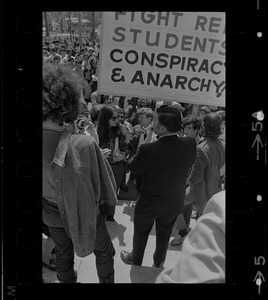 Josef Mlot-Mroz, a counter-demonstrator, with sign during student protests against US march into Cambodia and the killing of four Ohio students at Kent State