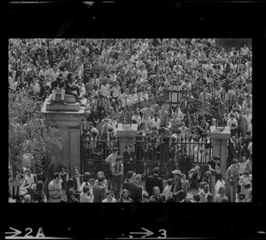 Boston area college students gathered in front of the State House gates to protest US march into Cambodia and the killing of four Ohio students at Kent State