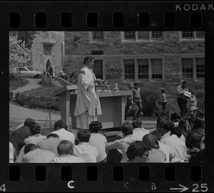Mass of the Resurrection service is offered at Boston College by Rev. Leo McDonough, S.J., for the four students killed during Kent State University protest