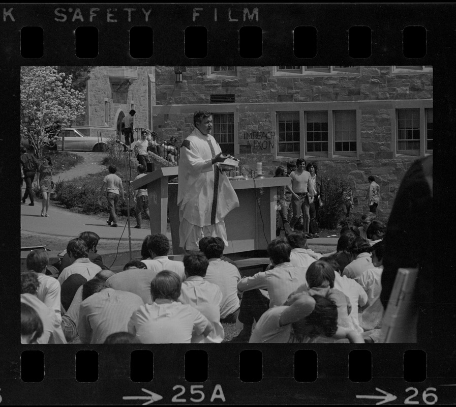 Mass of the Resurrection service is offered at Boston College by Rev. Leo McDonough, S.J., for the four students killed during Kent State University protest