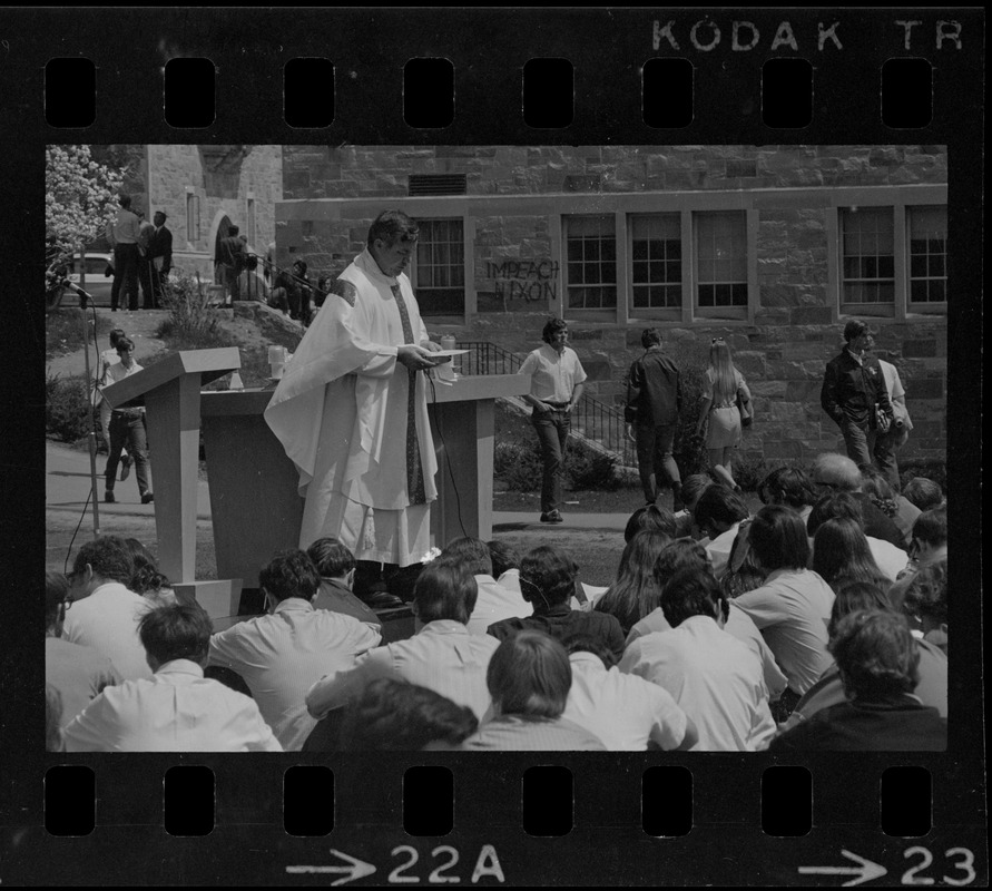 Mass of the Resurrection service is offered at Boston College by Rev. Leo McDonough, S.J., for the four students killed during Kent State University protest