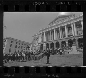 Boston area college students gathered on the steps of the State House entrance to protest US march into Cambodia and the killing of four Ohio students at Kent State