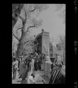 The Robert Gould Shaw memorial surrounded by Boston area college students gathered in front of the State House to protest against US march into Cambodia and the killing of four Ohio students at Kent State