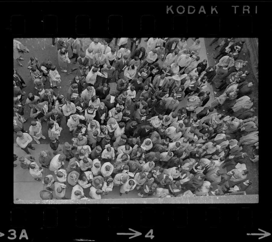 Overhead view of students gathered outside the Boston State College administration building where students have seized an office