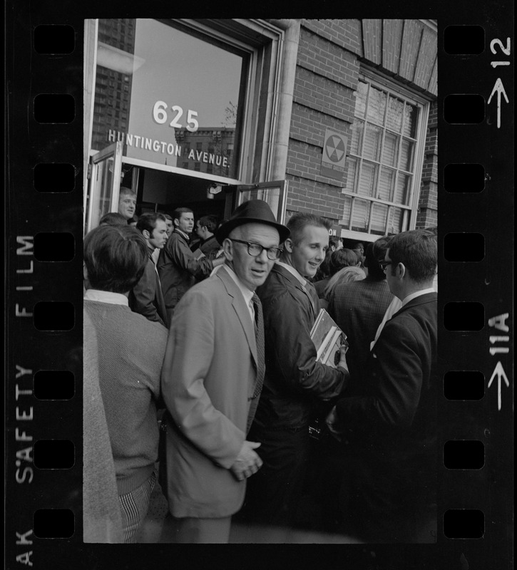 Boston State College president, John O'Neill, seen outside administration building where students have occupied an office