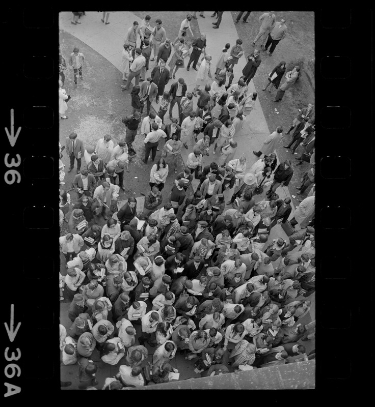 Overhead view of students gathered outside the Boston State College administration building where students have seized an office