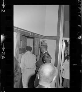 People entering Room 101, the office that was occupied by Black students during protest at Boston State College