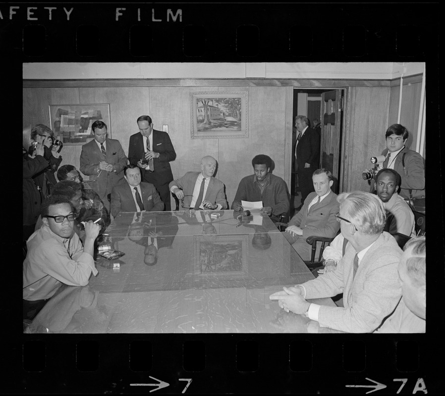 James Moore (right), leader of the Boston State College Black Student Association, President John O'Neill (center) and Trustees' Chairman John M. Cataldo (left) issued a joint statement of an agreement reached to end the Black student occupation