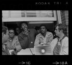 Jimmy Moore, spokesman for the Black Student Association of Boston State College, reads demands