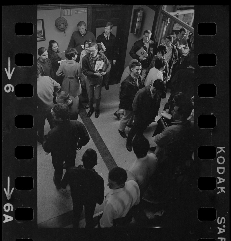 Crowd gathered outside room 101 of Boston State College administration building where Black students have seized an office