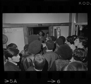 Crowd gathered outside room 101 of Boston State College administration building where Black students have seized an office