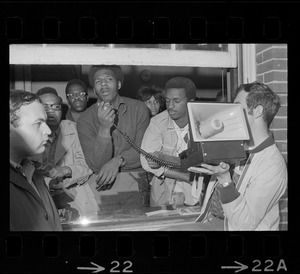 Jimmy Moore, spokesman for the Black Student Association of Boston State College, reads demands