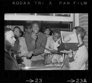 Jimmy Moore, spokesman for the Black Student Association of Boston State College, reads demands