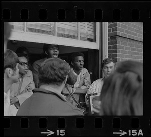 Jimmy Moore, spokesman for the Black Student Association of Boston State College, reads demands