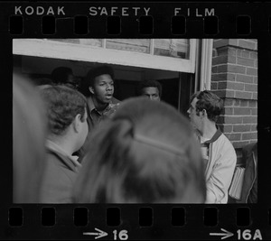 Jimmy Moore, spokesman for the Black Student Association of Boston State College, reads demands