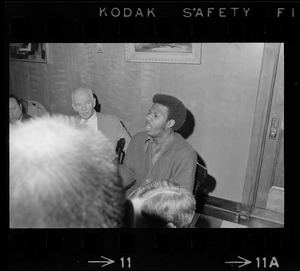 James Moore (right), leader of the Boston State College Black Student Association, President John O'Neill (center) and Trustees' Chairman John M. Cataldo (left) issued a joint statement of an agreement reached to end the Black student occupation