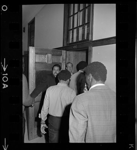 People entering Room 105 at Boston State College during the Black student protest