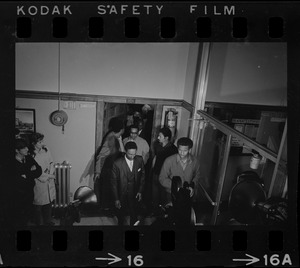 James Moore (right), Boston State College Black Student Association leader, leaving occupied room with others