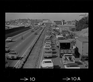 View of traffic on Southeast Expressway after runway train block the northbound lanes in South Boston