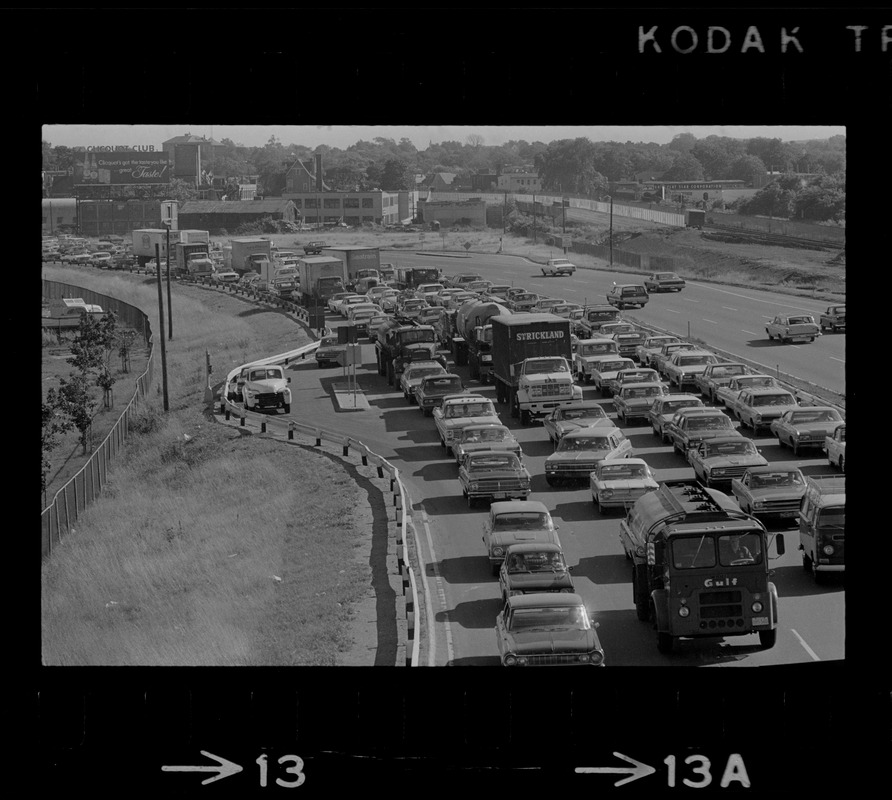 View of traffic in northbound lanes of Southeast Expressway after runway train accident in South Boston